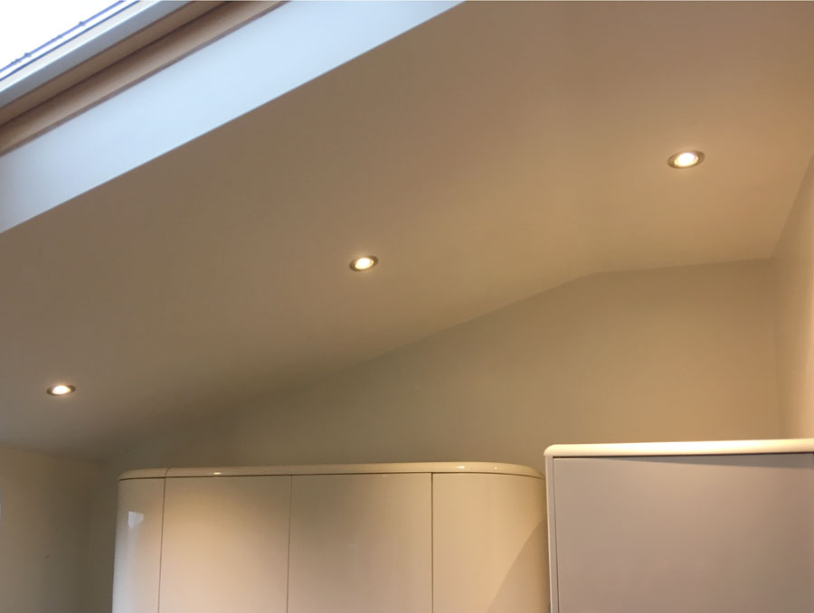Downlights in pitched roof.